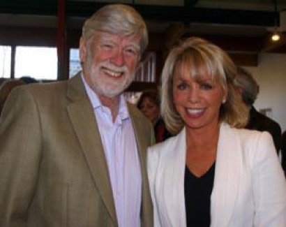 A man and woman posing for the camera.
