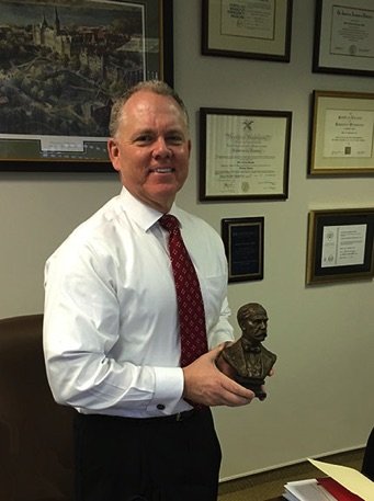 John Brennan with Carolyn Palmer sculpture