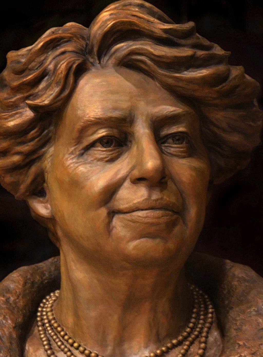 A close up of the face of an older woman