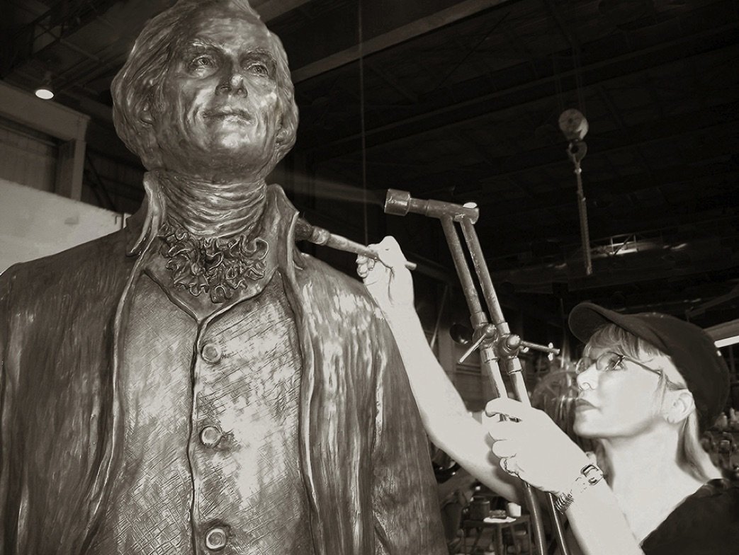 Carolyn Palmer working on Thomas Jefferson sculpture
